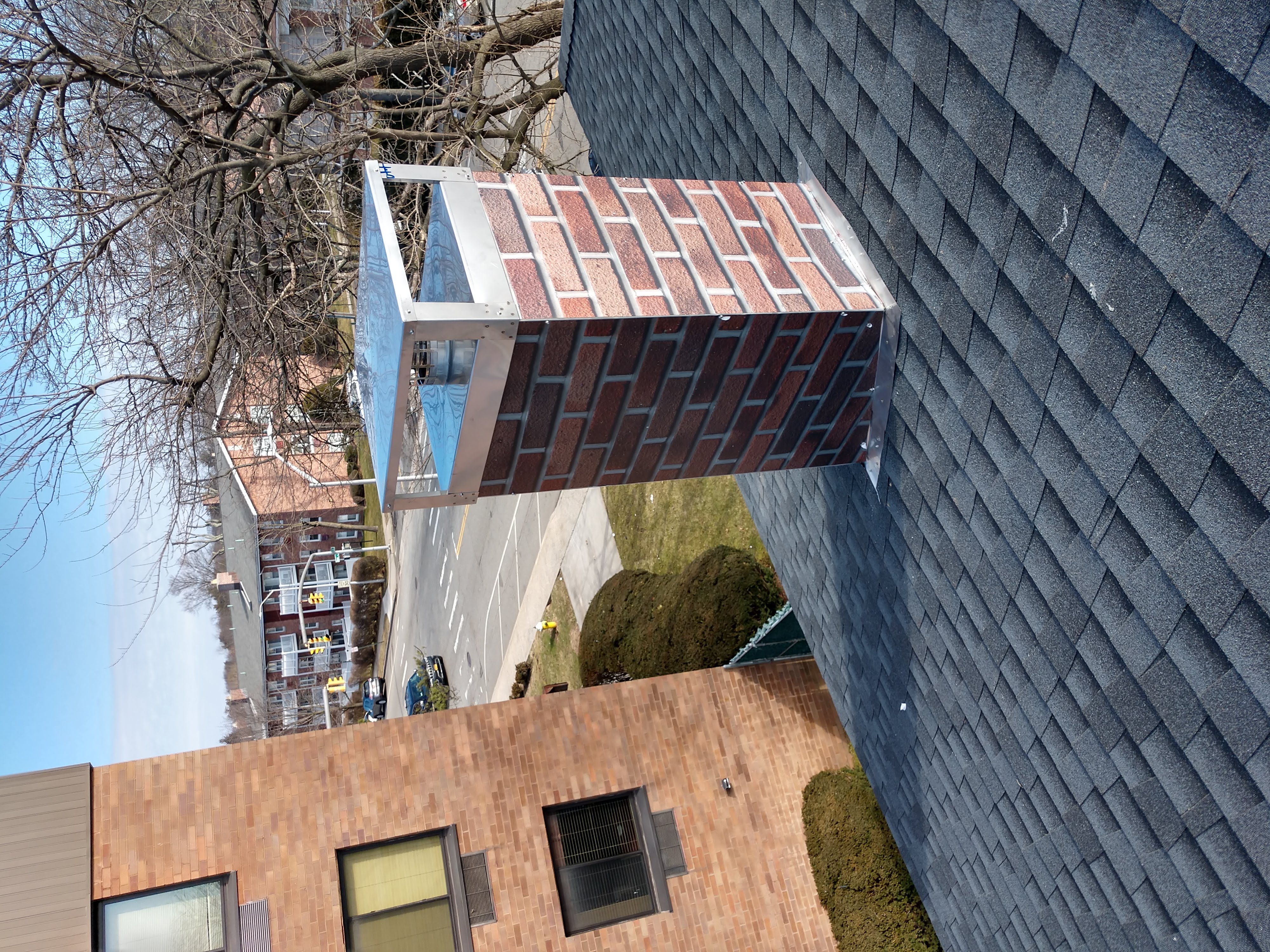 New elastomeric sealant applied to chimney crown in North Bellmore, NY
