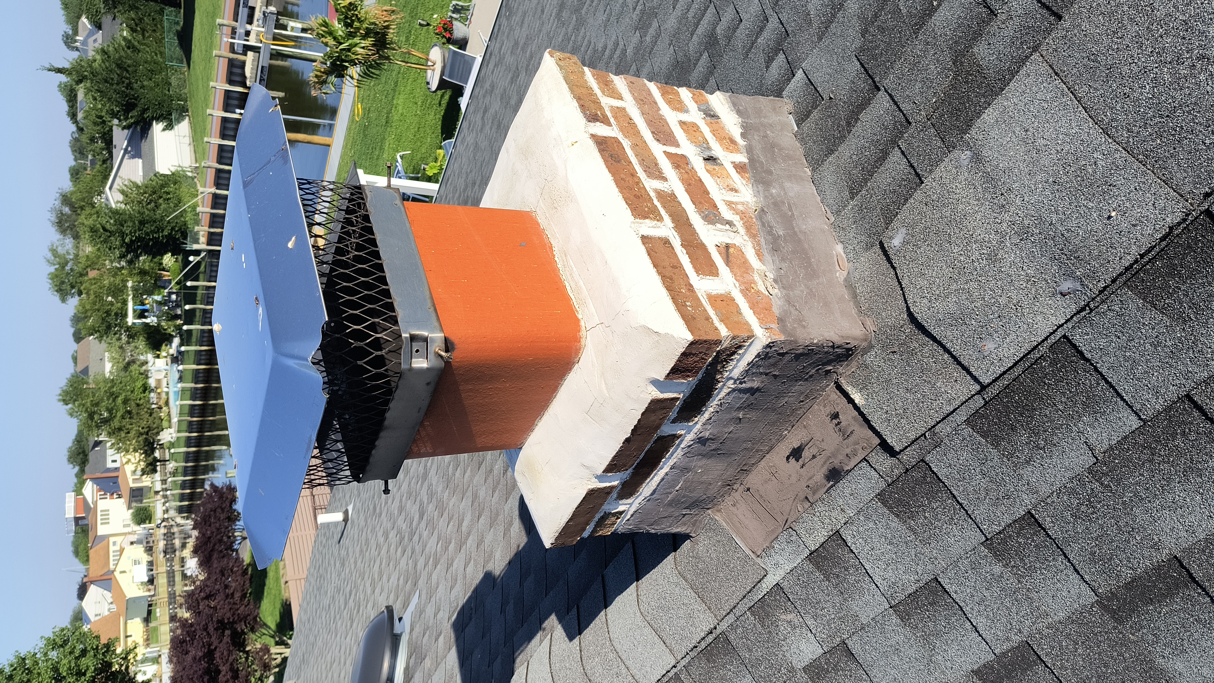 Full chimney masonry rebuild and restoration in North Bellmore, NY