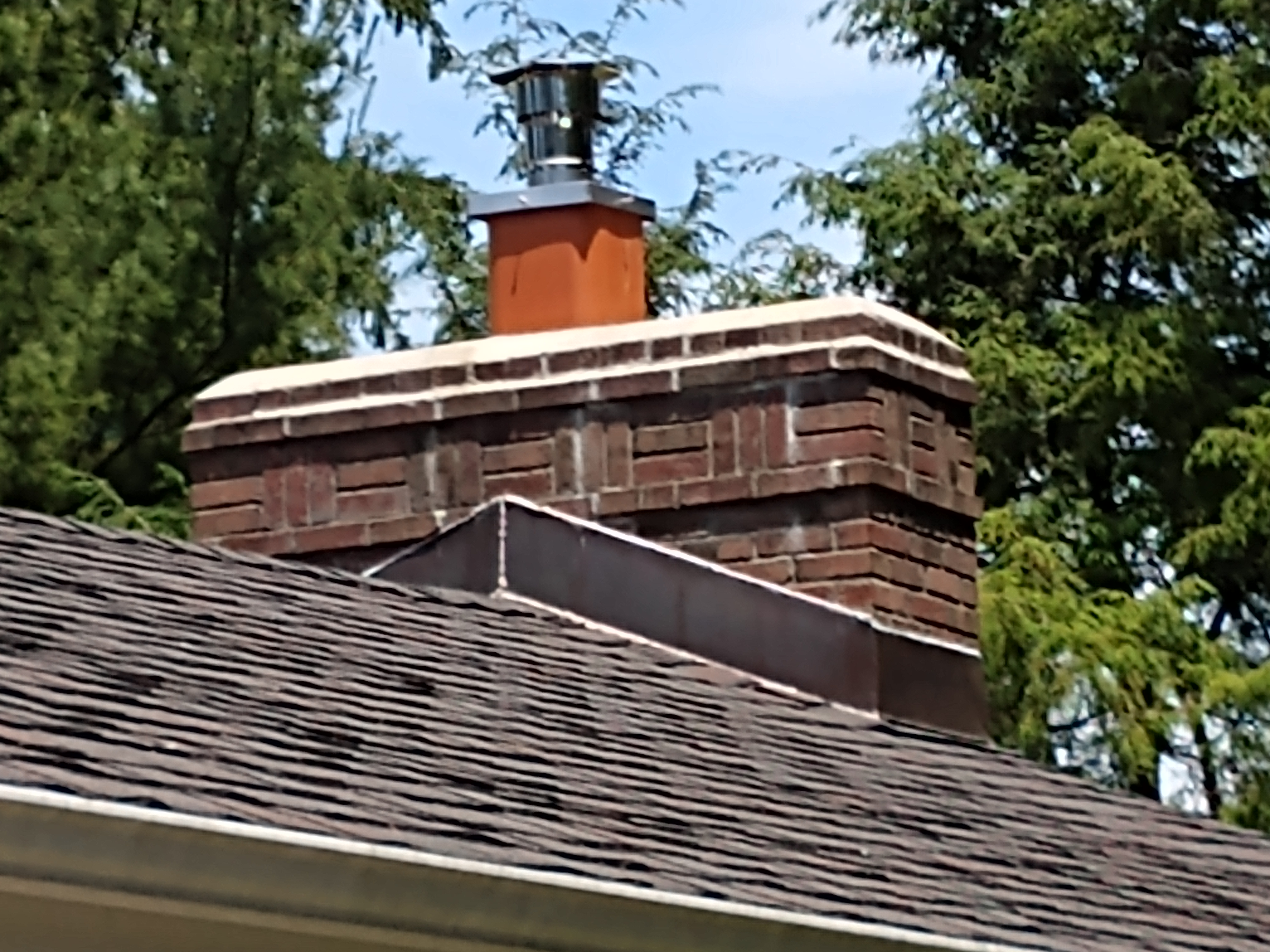 Stainless steel chimney cap with animal guard in North Bellmore, New York